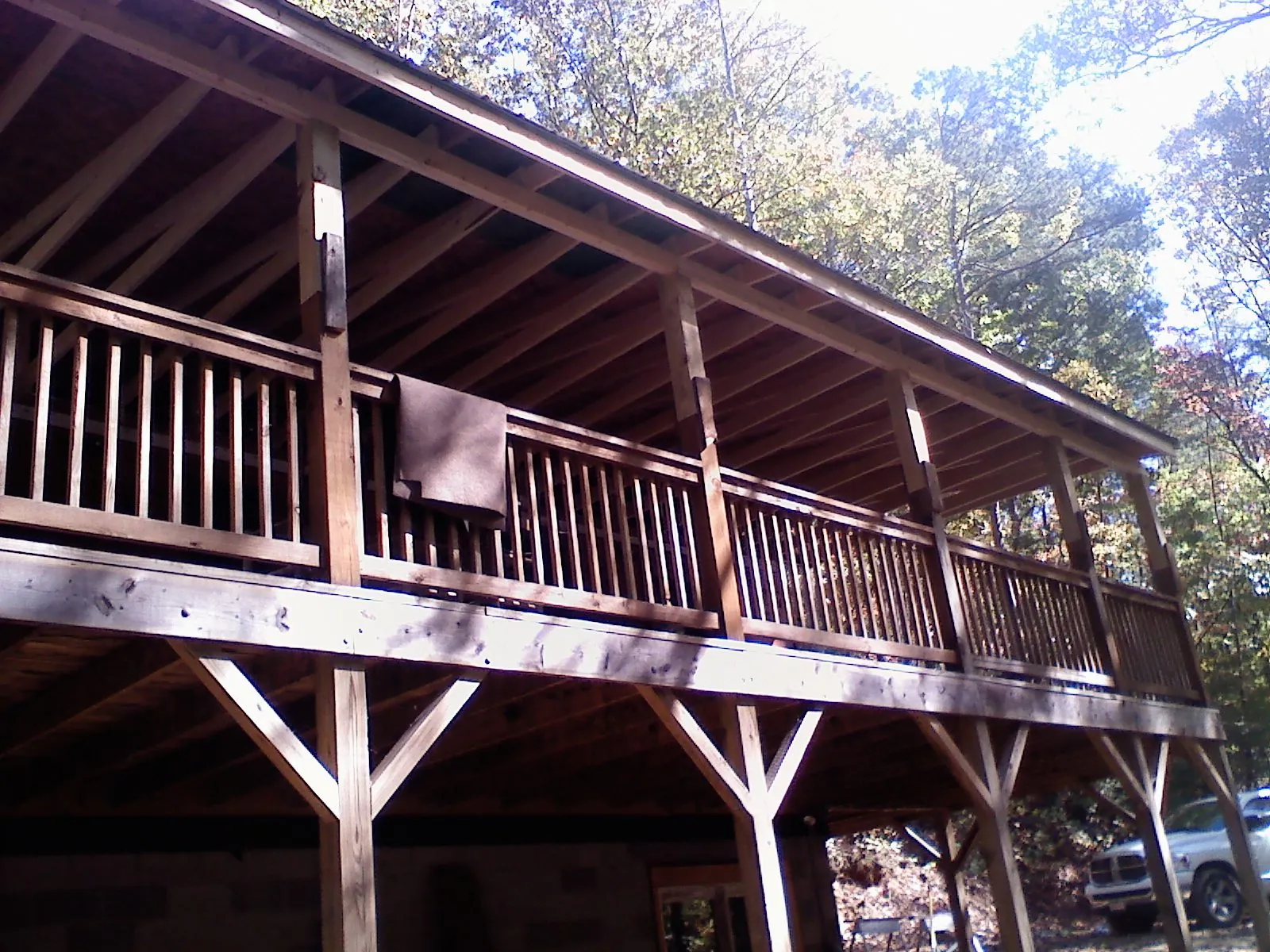 Timber framing under a new elevated porch and deck — Roof Leak Repair in Williamsville by Roofing Brothers